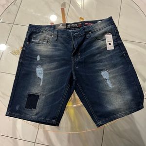 Men’s brand new distressed denim shorts.